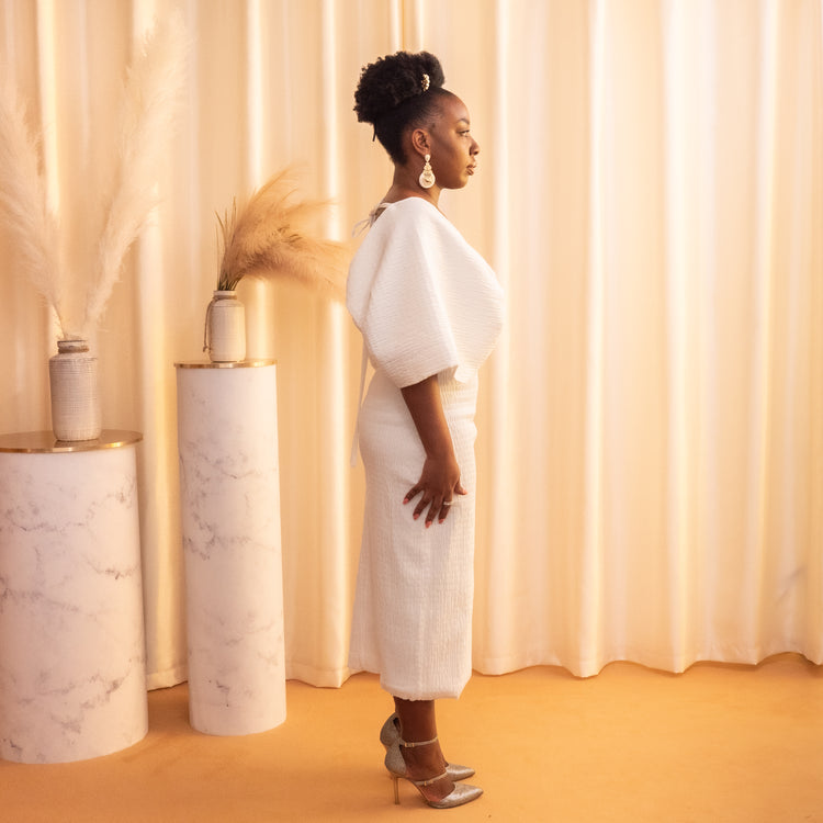 white midi dress by kim dave