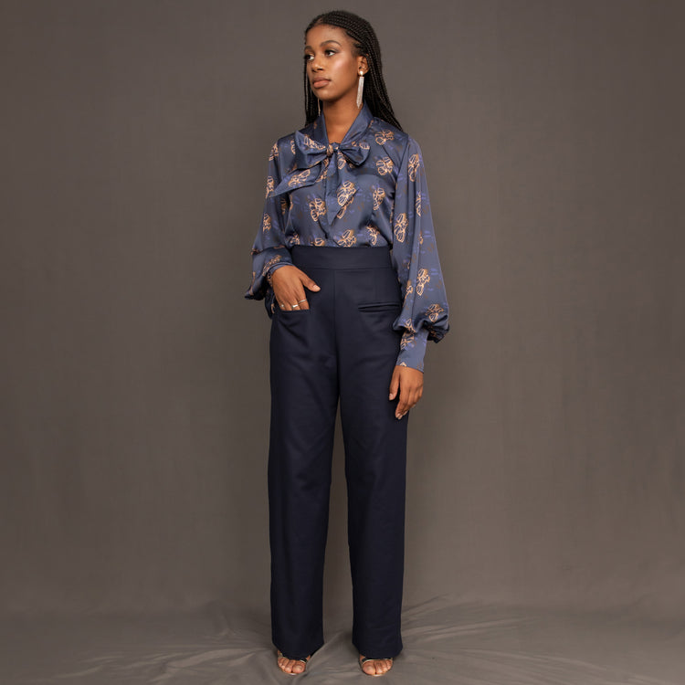 Navy high waisted trousers with wide leg and front double welt pockets by Kim Dave