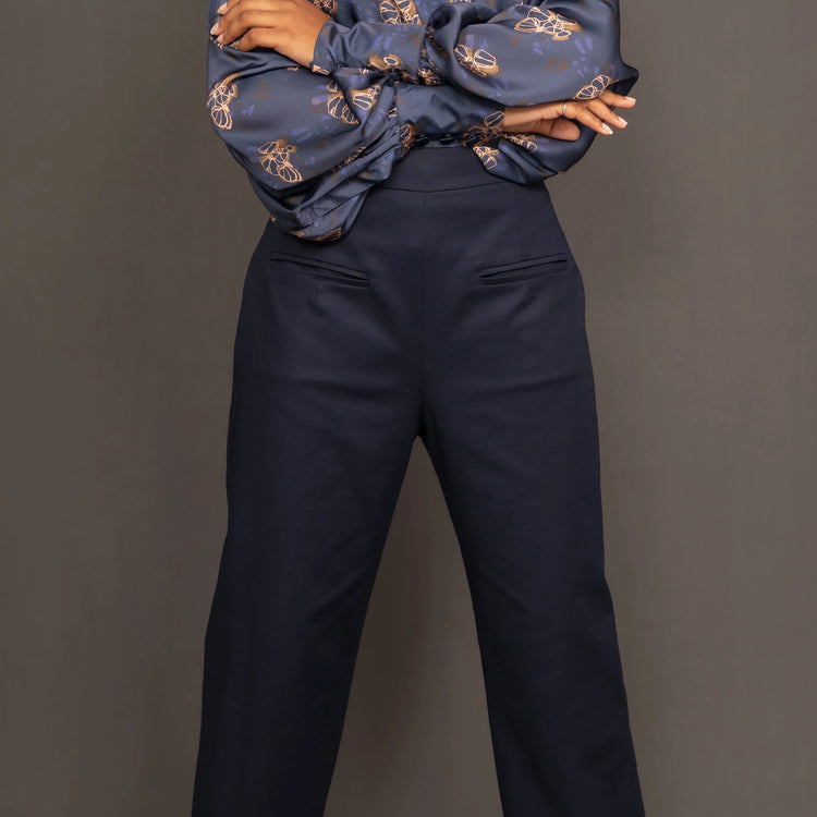 Navy high waisted trousers with wide leg and front double welt pockets by Kim Dave